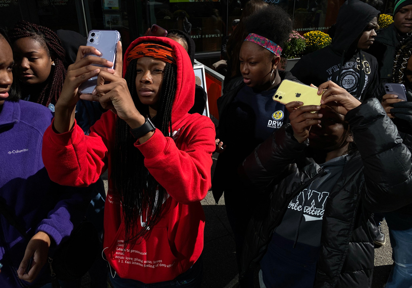 DRW College Prep students with iPhone 11.